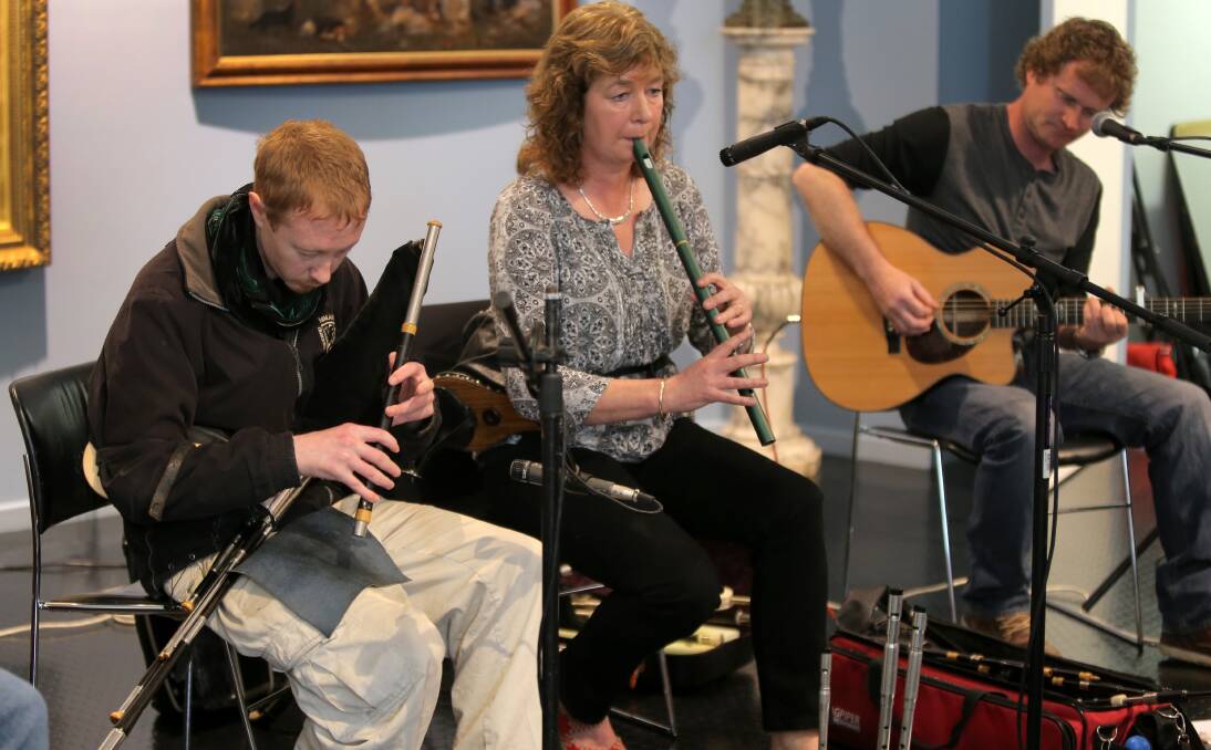 Corey Henderson, playing the uilleann pipes, performs with Merran Moir from local band Likely Celts at the Warrnambool Art Gallery to celebrate International Uilleann Piping Day. Picture: ROB GUNSTONE