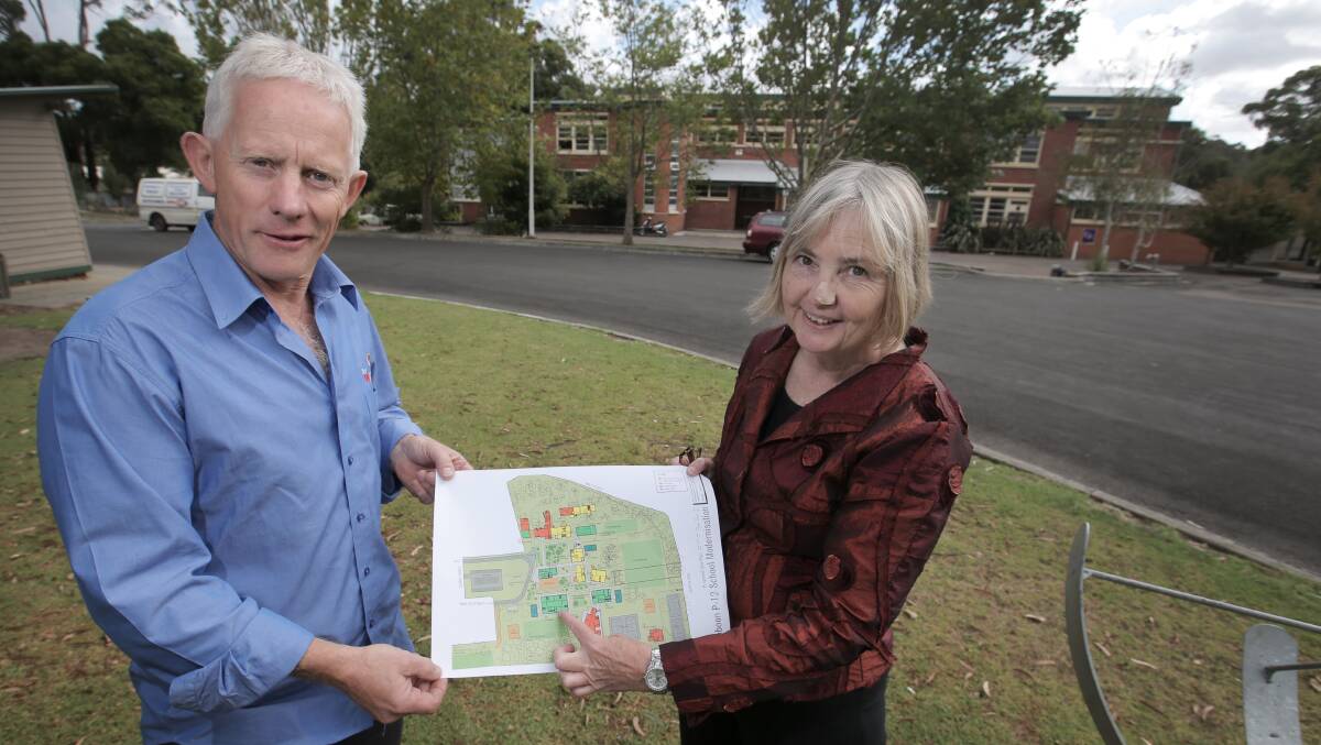 Timboon P-12 school council president Chris Hibburt and principal Rosalie Moorfield, with the plans for the rebuild of the school, after receiving a $5.2m funding grant from the State Government. 