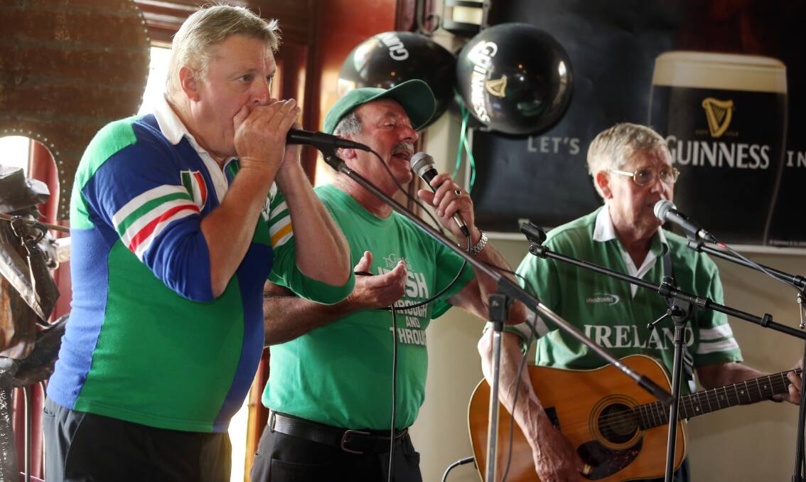 Michael Morgan, Tuddy Bowman, Tommy Brooks performing for St Patrick's Day Mickey Bourke's Koroit Hotel.  Picture: DAMIAN WHITE