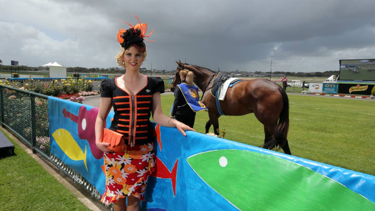 Fashions on the Field entrant winner Leah Habel from Port Fairy, with a hat made by Julie Gurry.