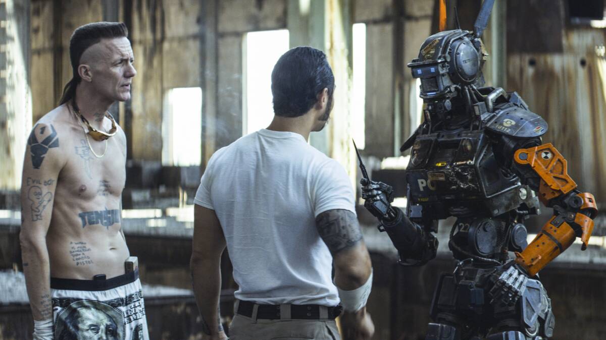 Chappie (right) is a wonderfully fascinating character and gives everything a central radiant point to revolve around.