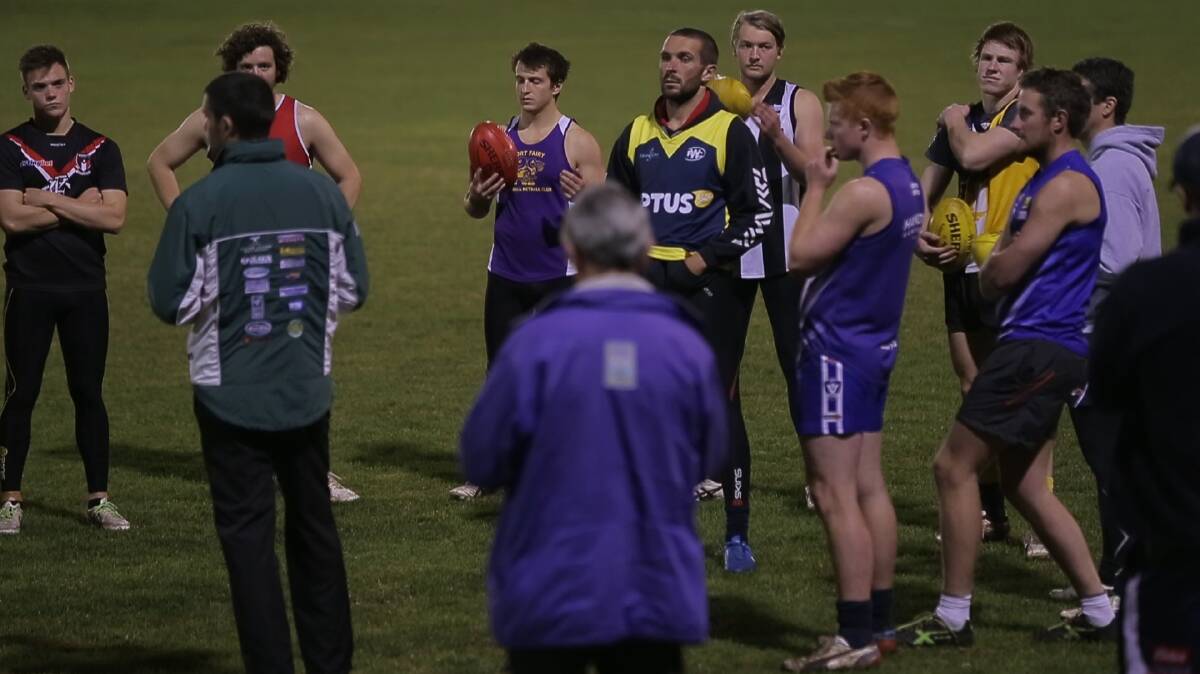 Hampden coach Chris McLaren addresses his young team at training on Tuesday night.