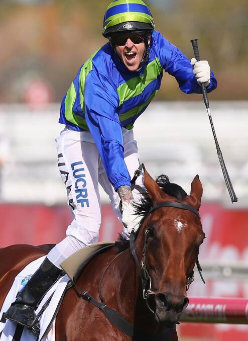 JOY: Jockey Nick Hall rode Jameka to a Caulfield Cup win. Picture: Getty Images