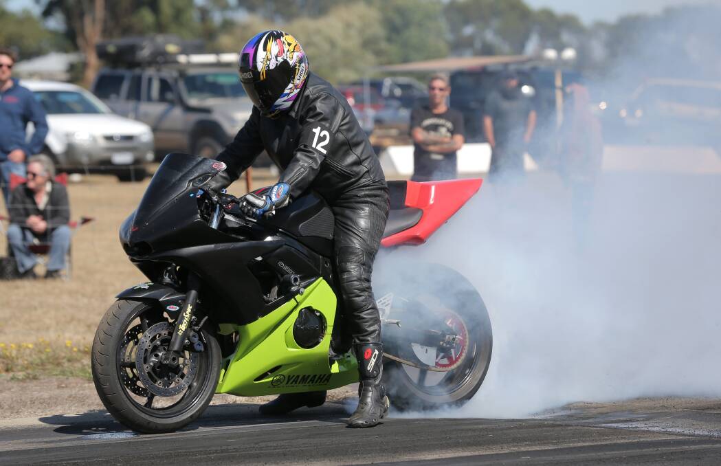 FIRED UP: Motorcycle rider Vince Connelly at Warrnambool and District Drag Racing Association meeting on Sunday. Picture: Vicky Hughson