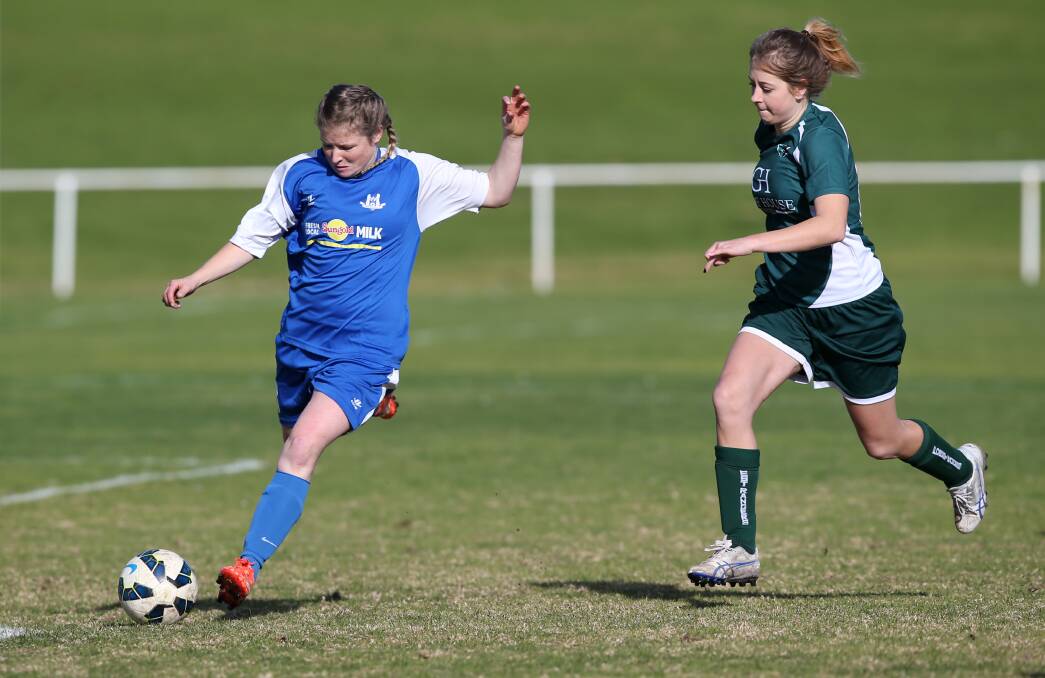 LEADER: Warrnambool Rangers captain Raya Rantall gets the ball away from Forest's Saffron Jones. Picture: Amy Paton
