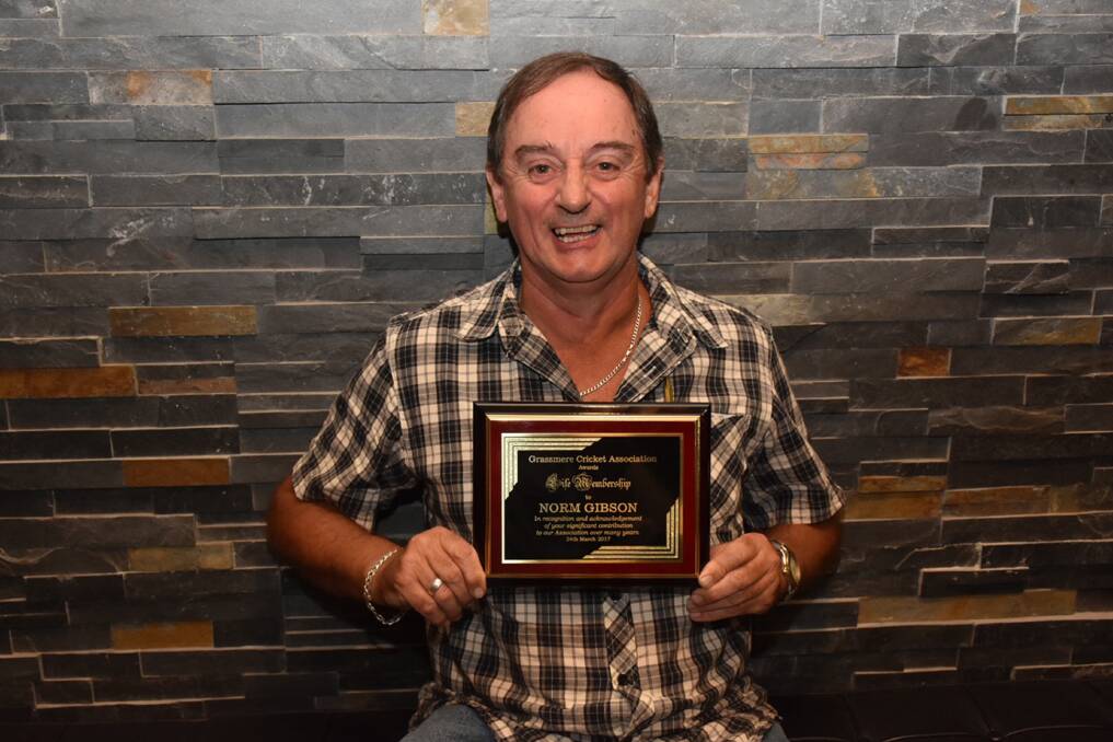 ALL SMILES: Long-time cricket country week team manager Norm Gibson was honoured with GCA life membership. Pictures: Vicki Malone