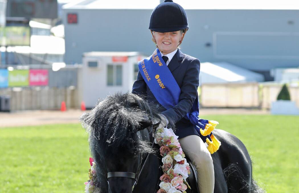 YOUNG STAR: Leslie Manor's Stella Horspole, 9, took out the shetland turnout in saddle 8-10 year-old rider class at the Royal Melbourne Show. Picture: Angie Rickard