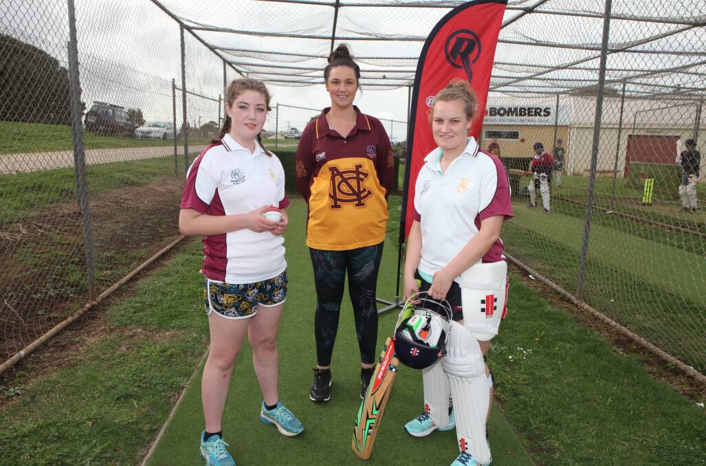 A LEAGUE OF THEIR OWN: Nestles cricketers Tahliyah Fulton (left), Kira Firth and coach Brooke Herbertson. Picture: Susie Giese