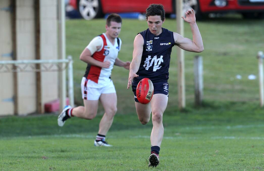 DOWN THE LINE: Warrnambool's Jackson Bell brings the ball out of defence against Koroit last Saturday. Picture: Rob Gunstone