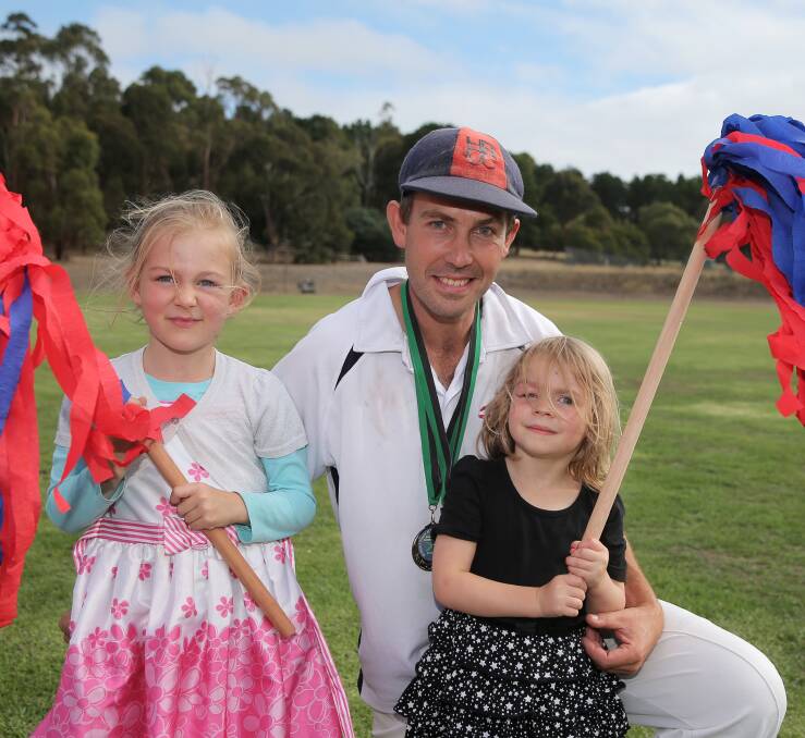 MAN OF THE MATCH: Daniel Balcombe - pictured with daughters Aurelia, 5, and Saphira, 3 - took 4-11 in Saturday's grand final. Picture: Rob Gunstone