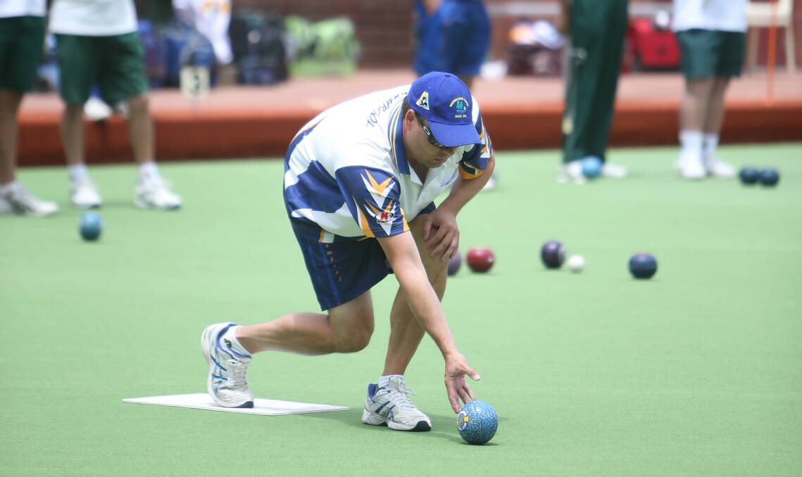 STEELY RESOLVE: Michael Steel of Warrnambool Gold, which is one of three teams vying for the top three spots in Western District Bowls Division's first division. Picture: Amy Paton