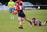 CHARGING IN: Lismore-Derrinallum's Brandon Greenwood gets a kick away during the qualifying final. His Demons take on Wickliffe-Lake Bolac again in the decider. Picture: Tracey Kruger