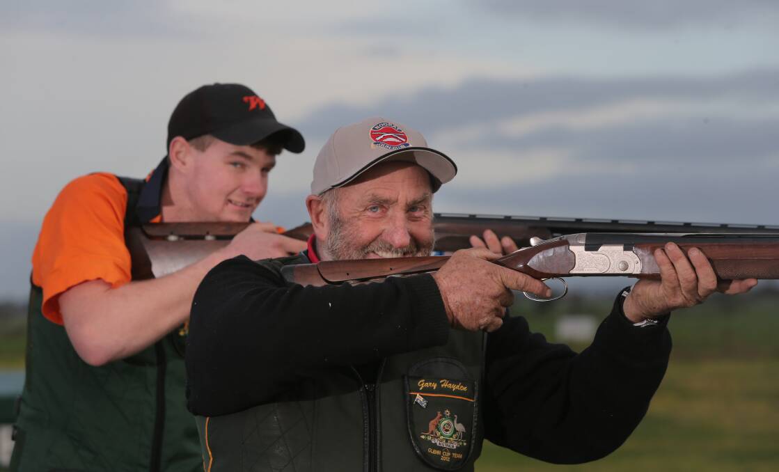 HITTING TARGETS: Noorat's James (back) and Gary Hayden were in fine form at the clay target world championships. Picture: Vicky Hughson
