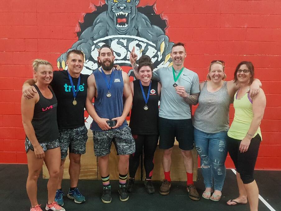 UP TO THE CHALLENGE: Warrnambool CrossFit team members Bec Rantall, Peter Ivanecky, Dylan Walsh, Georgi Pontonio, Simon Boyd, Stephanie Muir, Pam Wilson. Picture: supplied