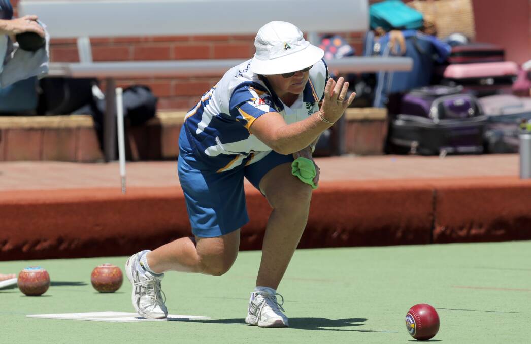 FINE FORM: Warrnambool Gold's Linda Creek pushes her bowl on its way in Tuesday's pennant game against Port Fairy Gold. Picture: Rob Gunstone