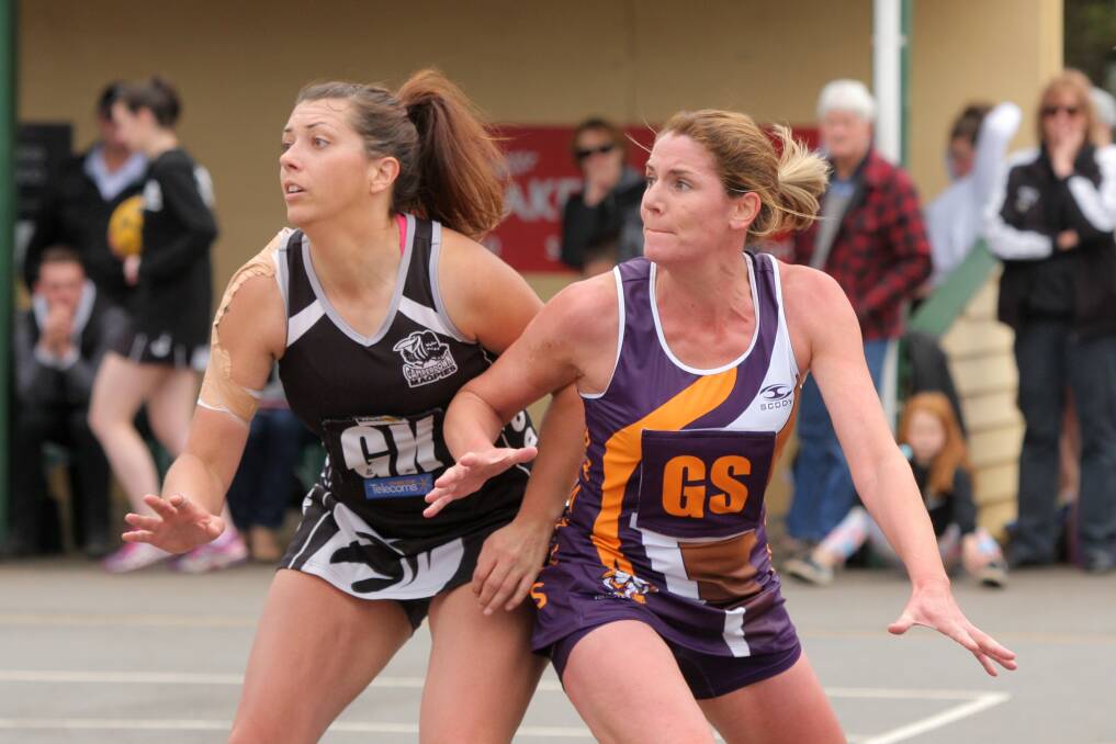 CLOSE CONTEST: Emma Wright and Carley Thomas jostle for position in the qualifying final. Picture: Vicky Hughson