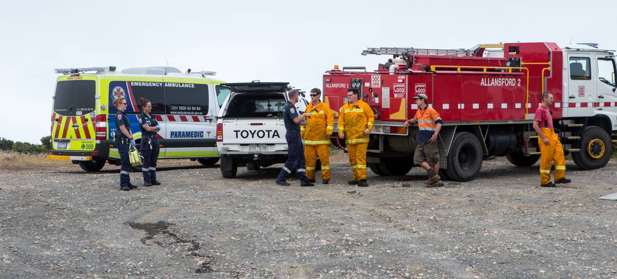 NOT NEEDED: Emergency services gather near Lake Gillear on Sunday in the hope of finding an injured motorbike rider. Picture: Christine Ansorge