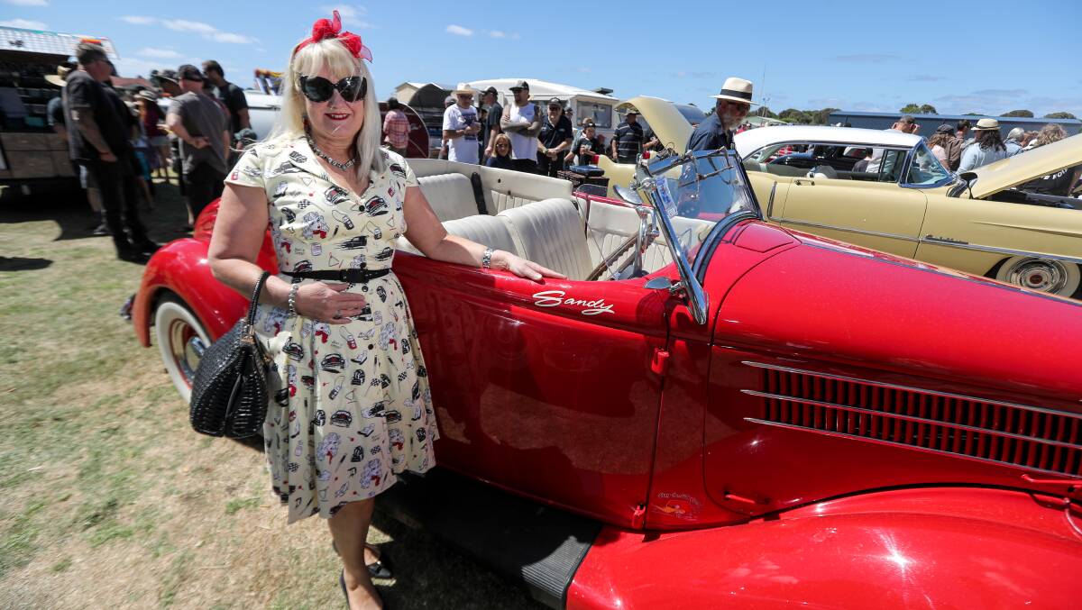 WAY OF LIFE: Port Fairy's Sandy Winnen and her 1936 Ford Roadster at Sunday's Port Fairy Rod Run. Organisers said more than 500 cars and motorbikes were on display. Picture: Rob Gunstone