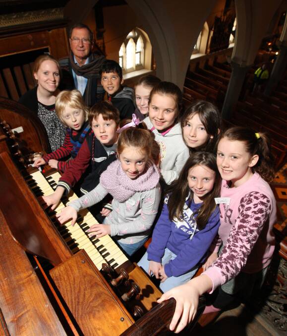IN TUNE: (Back, from left) David Clarke with Massi De Ros, 9, Ellie Holden, 8, Ailish Murfitt, 9, Anna Barker, 11, Emily Hovey, 11. (Front) Sonia Gellert, Daniel Duffy, 8, James Hovey, 9, Hannah Vandecamp, 8, and Alyssa Miles O'Bray, 10.