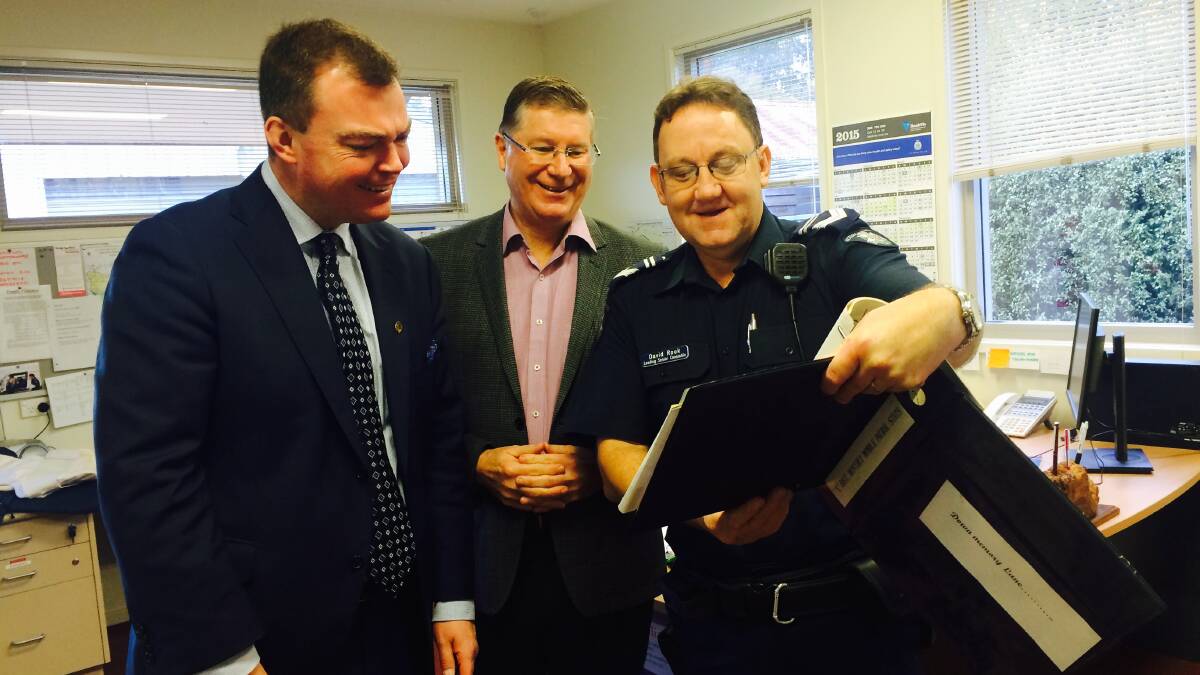 THIN BLUE LINE: Shadow Police Minister Edward O'Donohue with South West Coast MP Denis Napthine and Senior Constable David Rook of Macathur police.