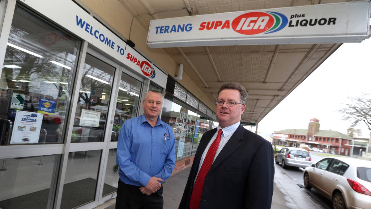 GLOWING REPORT: Terang Co-op general manager Charlie Duynhoven and board chairman Nigel Bruckner outside the IGA supermarket yesterday. Picture: DAMIAN WHITE