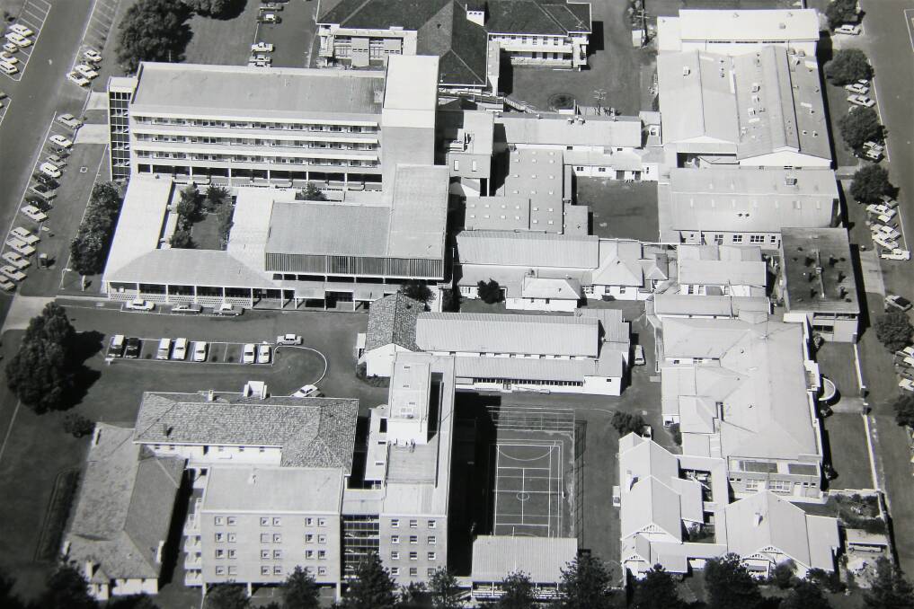 ALTERED: An aerial shot of Warrnambool Base Hospital from April 1985. The old nurses home and an attached tennis court is in the foreground. 