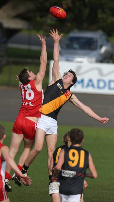 TALENTED TIGER: Portland ruckman Ben Malcolm leaps high earlier this season against South Warrnambool. Malcolm won his team's senior best and fairest award for 2015.