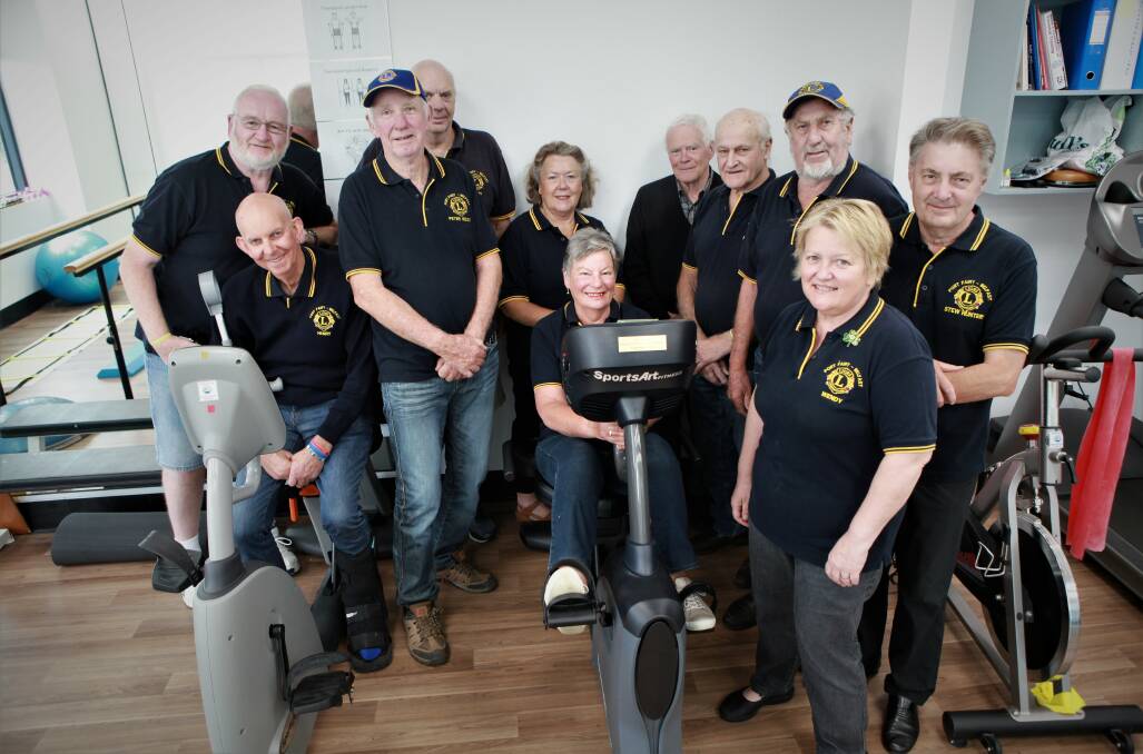 GOOD FIT: Members of the Port Fairy Belfast Lions Club in the Moyne Health Services community health centre gym where they have helped fund new equipment.