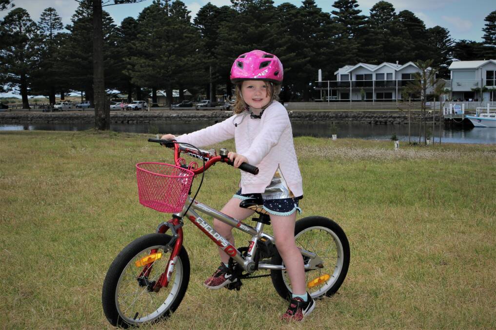 NICE PLACE: Gracie Bolte, 4, from Geelong, enjoys Battery Hill during her summer holiday stay in Port Fairy with her family. The area is being well used by the public. Picture: Anthony Brady