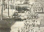 Runners in the 1983 Warrnambool Surf T Surf Fun Run charge down Liebig Street. File picture 