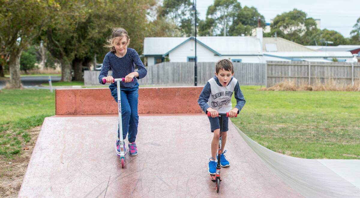 ON THE GO: Heidi Fry, 8, and Ellian Fry, 6, enjoy some holiday time at the Koroit Skate Park. Plans to improve the area are on display for public feedback. Picture: Christine Ansorge