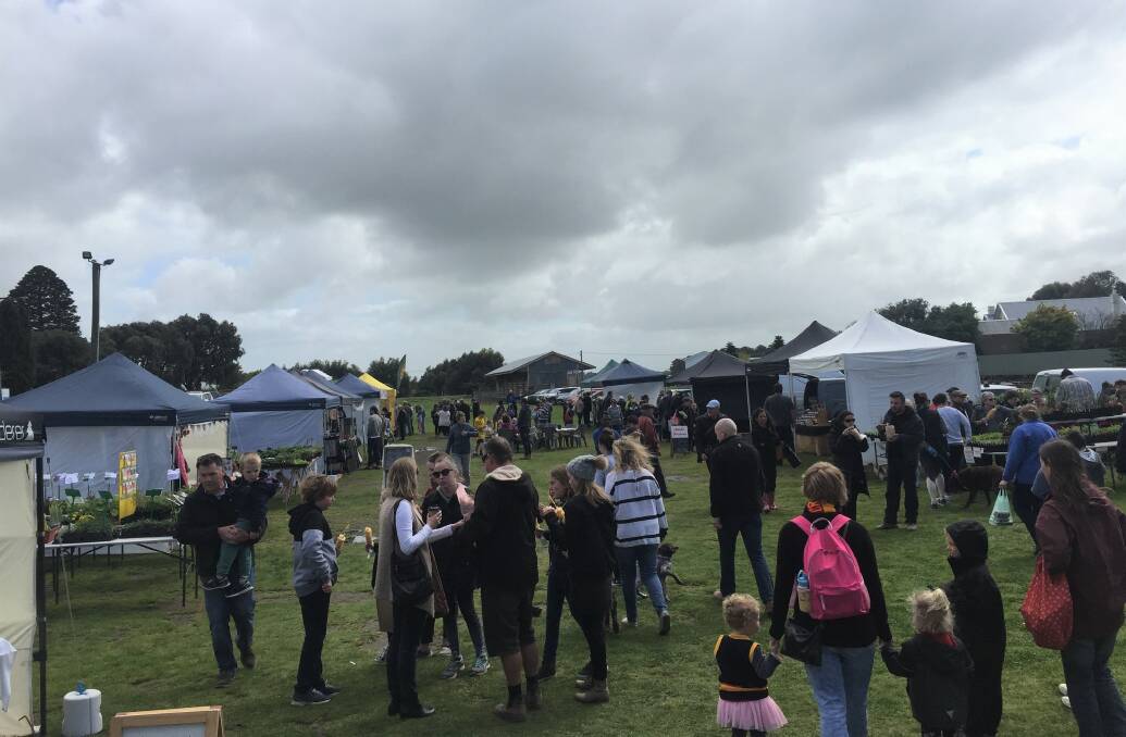 BROWSING: The Port Fairy Community House Market at Railway Place. 