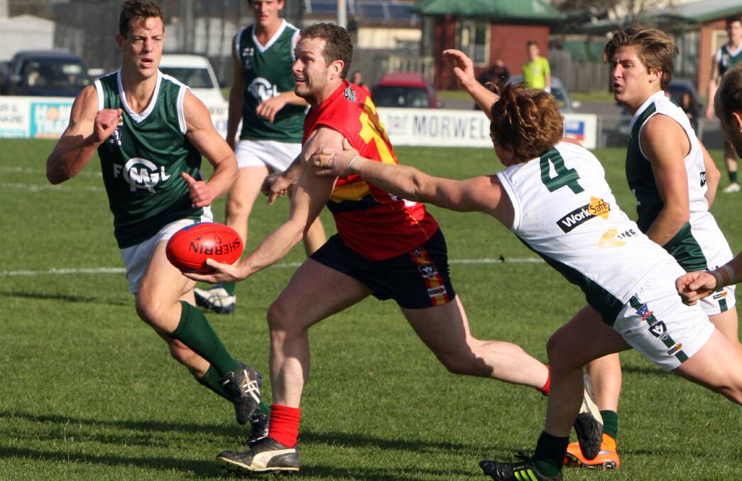 ON THE MOVE: Gareth Crawford in action for the Warrnambool and District interleague team last year. Crawford will play for the Western Magpies in Queensland in 2016.