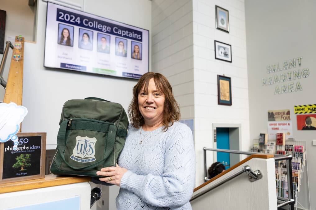 Former Warrnambool College student Sharon Warren, with an old school bag, is getting ready for a 30 year celebration for the school. Picture by Anthony Brady