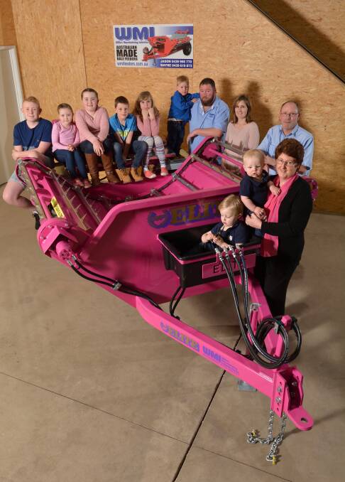 PRETTY: The team from Willie’s Manufacturing Industries in Warrnambool show off the pink bale feeder which it has donated to South West Healthcare's online auction. 
