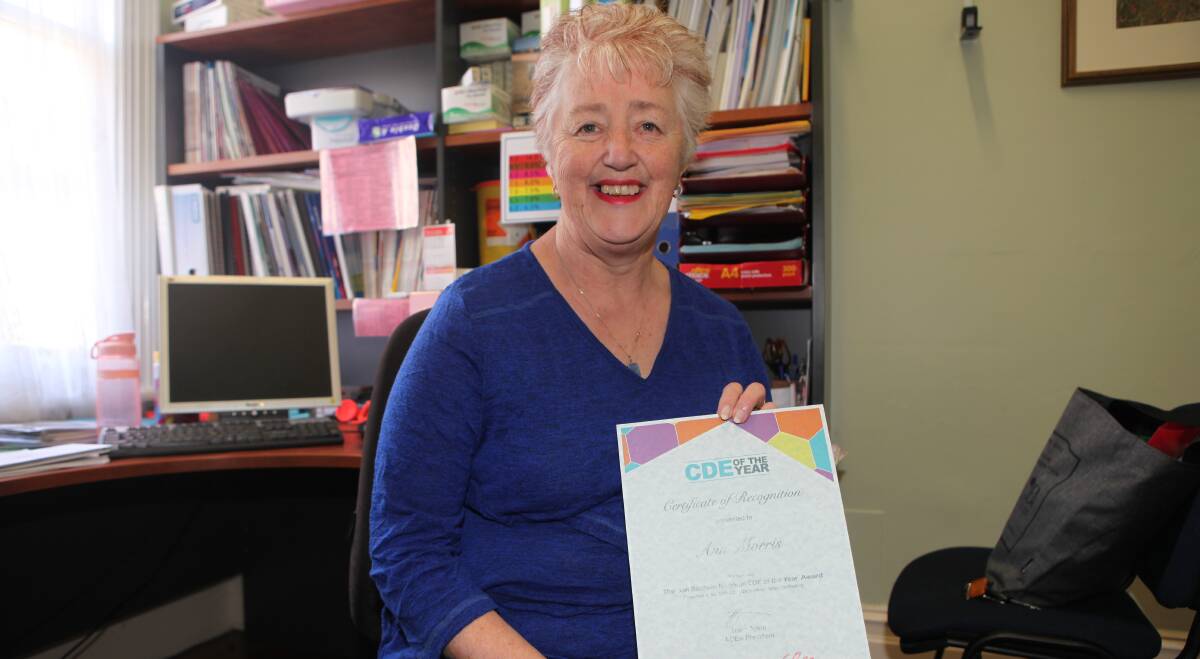 WINNER: Ann Morris with the certificate she won as Australian Diabetes Educators Association diabetes educator of the year. Picture: Anthony Brady