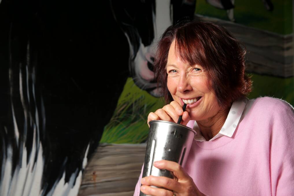 Wendy Couch drinking a milkshake at Cheeseworld as she gets ready for the Fit, Fab and 50 Challenge.   