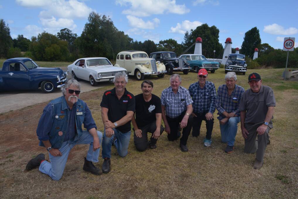 MOTORING: Members of the Warrnambool and District Historical Vehicle Club and some of the Holdens that will be on display on Sunday at Lake Pertobe. 