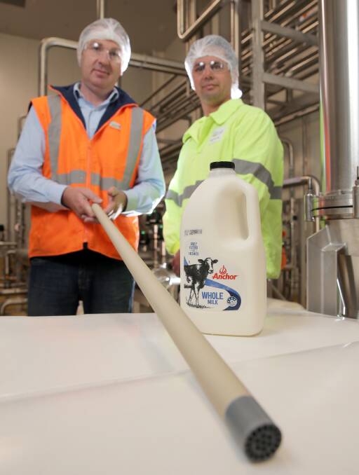 INNOVATIVE: Fonterra Cobden production manager Brett Rowlands, holding one of the new microfiltration tubes, and production supervisor Brad Matin. Picture: Rob Gunstone