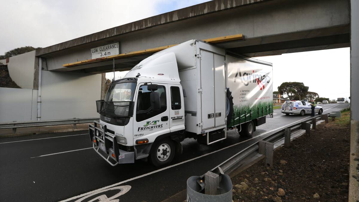 TIGHT FIT: This delivery truck was a touch too tall to fit under the Simpson Street rail bridge. Picture: DAMIAN WHITE