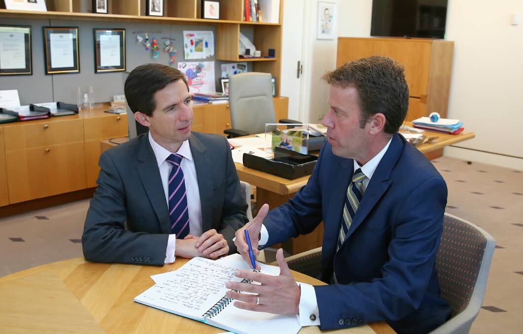 ON THE SAME PAGE: Wannon MP Dan Tehan and Minister for Education and Training Simon Birmingham discuss the Deakin University situation. Picture: Alex Ellinghausen