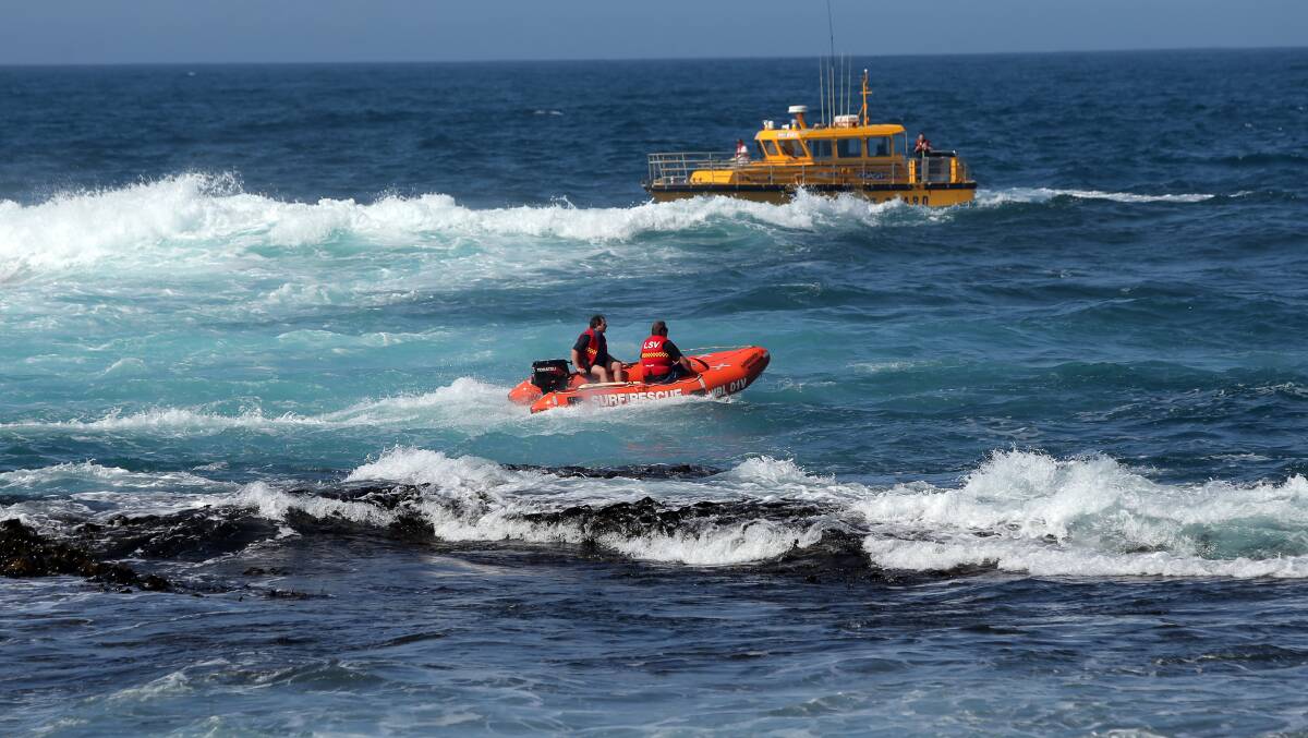 Surf life savers and the Warrnambool Volunteer Coast Guard search the area around the La Bella Reef. Picture: Rob Gunstone