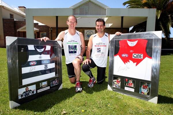 Signed AFL guernseys are among items to be auctioned for charity while John Keats, left, and Greg Kew begin a 24-hour treadmill challenge from noon today at the Civic Green.