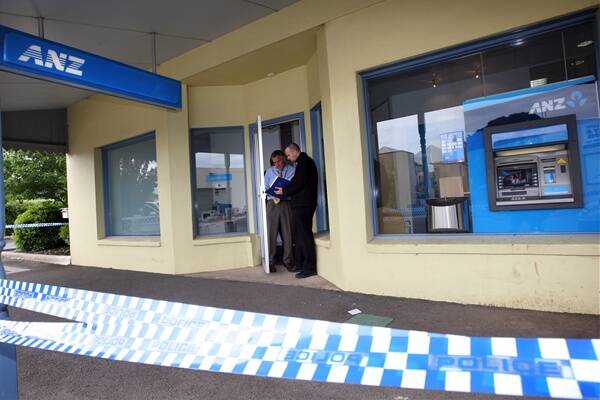Detectives at the scene of the crime at Koroit’s ANZ bank last year after armed robber Martin Driwver’s audacious raid.