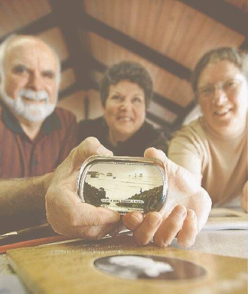 An old paperweight depicting the Bay of Martyrs has been uncovered. Richard and Jenny Stevens, with Lynda Avery (right), are searching for artefacts to learn more about Peterborough. 081106AM05 Picture: ANGELA MILNE