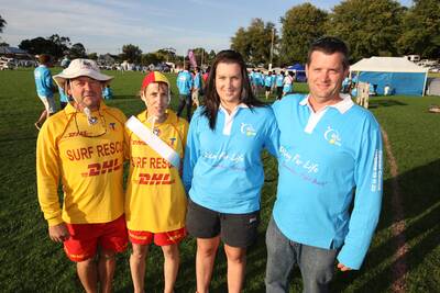 Relay for Life at Camperdown's Leura oval on Saturday evening. Pic shows from left: Port Campbell Surf lifesaving club team members: James Green, Kaye Meek and Ali Meek and Craig Saunders. They walked in honour of Kaye's late husband - Stuart Meek.100320GW52 GLEN WATSON