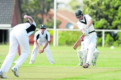Grassmere's Phil Edwards hits Warrnambool's Tom Bowman to leg at Davidson Oval.Pictures: DAMIAN WHITE