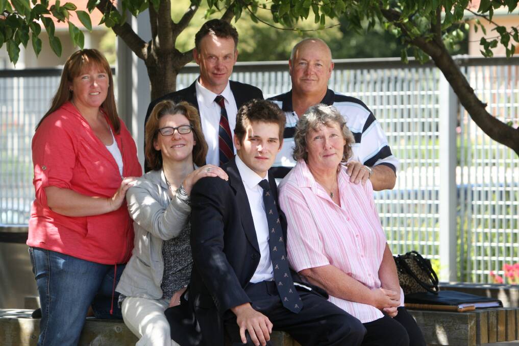 Charlie Scott (centre front) was the driver of a car that killed his friend Troy Jenkins, whose family supported him throughout the tragedy and court case.