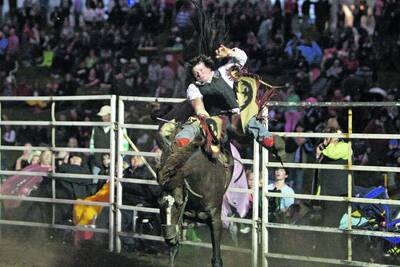 A rider takes on a beast at the rodeo in Allansford earlier this year. 110108AS44 Picture: Aaron Sawall