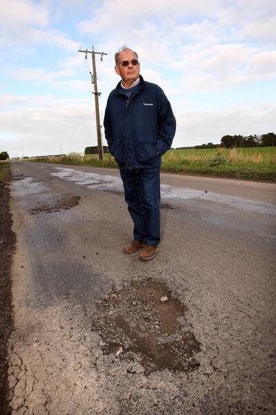 NEWS: Our Worst Roads, Pictured is Peter Fraser standing along Spencers road west of Koroit. .110722DW03 Picture DAMIAN WHITE